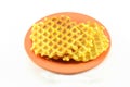 Isolated image. roasted savory waffles on a brown saucer