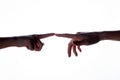 Isolated image of a silhouette of the boy`s hands reaching for the woman`s hand. Hands of mother and son. The concept of family, Royalty Free Stock Photo