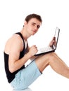 Isolated image of a young man with his laptop. Royalty Free Stock Photo
