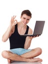 Isolated image of a young man with his laptop. Royalty Free Stock Photo