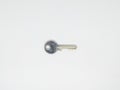 Isolated key in white background Royalty Free Stock Photo