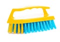 Isolated kitchen scrubbrush with yellow handle Royalty Free Stock Photo
