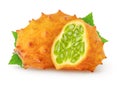 Isolated kiwanos. One fresh kiwano melon fruit and a half with leaves isolated on white background with clipping path.