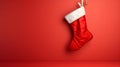 Isolated light red Christmas Stocking in front of a festive Background. Cheerful Template with Copy Space Royalty Free Stock Photo
