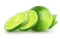 Isolated lime slices.Whole and sliced lime fruits with leaves isolated of white background with clipping path. Royalty Free Stock Photo