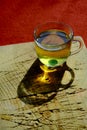 Isolated linden tea cup made of glass