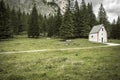 An isolated little chapel St. Silvester among the woods in the Italian Dolomites Royalty Free Stock Photo