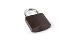 Isolated locked textural brown padlock on a white background