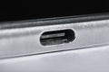 macro photo port usb type c on the metal frame of the smartphone