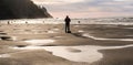Isolated Male Photographer and Tripod Standing on Ocean Beach
