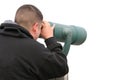 Isolated man looking throu binoculars