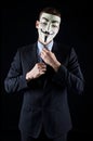 Isolated man wearing Vendetta mask Royalty Free Stock Photo