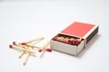 Isolated Match in the box with white background. Matchbox closeup.