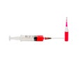 Isolated medical syringe with a red vaccine, for cosmetology and medicine, used for medicines with a red vaccine close-up