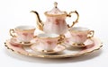 Isolated Miniature Tea Party Set with Cups and Saucers -Generative Ai Royalty Free Stock Photo