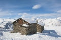 Isolated mountain hut in the snow Royalty Free Stock Photo