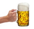 Isolated mug of beer holding in hand at Oktoberfest in Bavaria