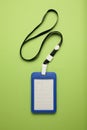 Isolated name tag mockup on green background. Badge and lanyard, vip pass