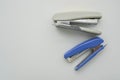 Isolated office stationary of blue and white stapler in workplace for business documents