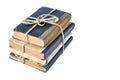 Isolated old books tied with string on white background, ancient books in pile Royalty Free Stock Photo