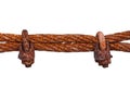 Isolated old rusty steel wire rope and metal cable or hawser are connected by rusty old clamps. Close up. Royalty Free Stock Photo
