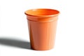 Orange Plastic Cup on White Background for Drinkware Mockups Royalty Free Stock Photo
