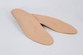 Isolated orthopedic insoles on a white background. Medical insoles. Foot care. Insole cutaway layers. Treatment and Royalty Free Stock Photo