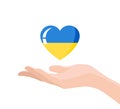 Isolated palm and heart in the colors of the Ukrainian flag. Concept of peace. A human hand supporting a heart. Stock
