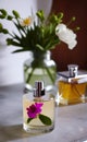 Isolated parfume bottle: homemade beauty care made of flowers