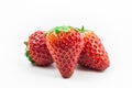 Strawberry fruits isolated in white close up and macro shot.