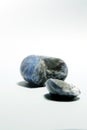 Isolated picture of broken lucky stone on white background