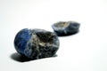 Isolated picture of broken lucky stone on white background