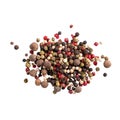 Isolated pile of assorted peppercorns on white