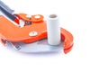 Isolated pipe cutter with plastical pipe close up Royalty Free Stock Photo