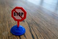 Isolated plastic toy warning sign - STOP. Danger ahead, do not enter