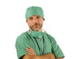 Isolated portrait of attractive and handsome medicine doctor or hospital nurse man in surgical bouffant hat and medical scrub Royalty Free Stock Photo