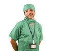 Isolated portrait of attractive and handsome medicine doctor or hospital nurse man in surgical bouffant hat and medical scrub Royalty Free Stock Photo