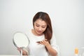 Isolated portrait of a beautiful young woman comb long hair Royalty Free Stock Photo