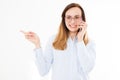 Isolated portrait of business girl with smartphone. Woman tolking on phone and points with his hand. Confident young manager. Copy Royalty Free Stock Photo