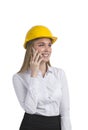 Isolated portrait of a businesswoman wearing a yellow hard hat. Royalty Free Stock Photo