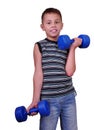 Isolated portrait of child exercising with dumbbells