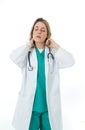 Isolated portrait of frustrated and tired female Doctor Nurse Wearing white coat hospital uniform