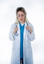 Isolated portrait of frustrated and tired female Doctor Nurse Wearing white coat hospital uniform