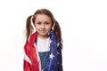 American little girl with USA flag. Citizenship, immigration, emigration, winning green card lottery and freedom concept