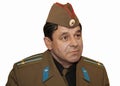 Isolated portrait on a white background of an officer lieutenant colonel of the Soviet army in a soldier\'s cap, humor