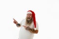 Isolated portrait on a white background of an overweigh man in Santa Claus hat gesturing with finger. copy space