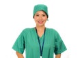 Isolated portrait of young beautiful and happy Asian Korean medicine doctor woman or hospital nurse in medical hat and scrub Royalty Free Stock Photo