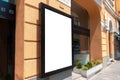 Isolated poster mockup on street building wall