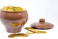 Isolated pot with golden coins. Abstract photo of lucky