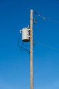 Isolated power pole with working utilities in Rocky View County Alberta Royalty Free Stock Photo